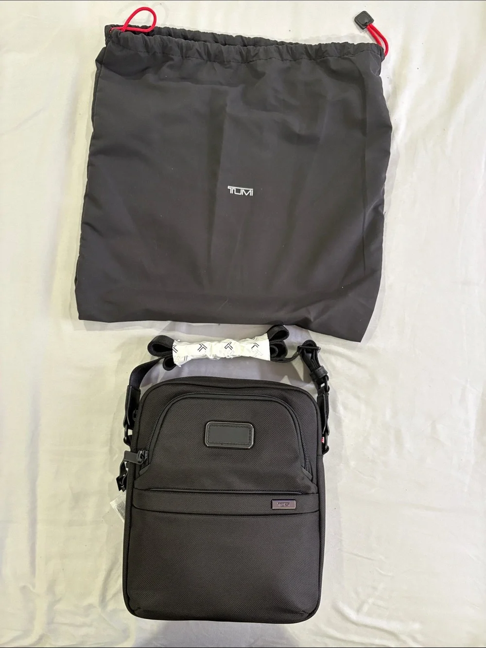 Tumi Black Men's Crossbody Messenger Bag with Red Accents